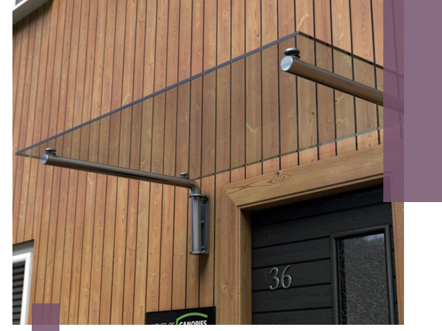 Стеклянные козырьки на входы и фасады в Новосибирске